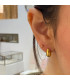 boucles d'oreilles dorée et strié Emmy